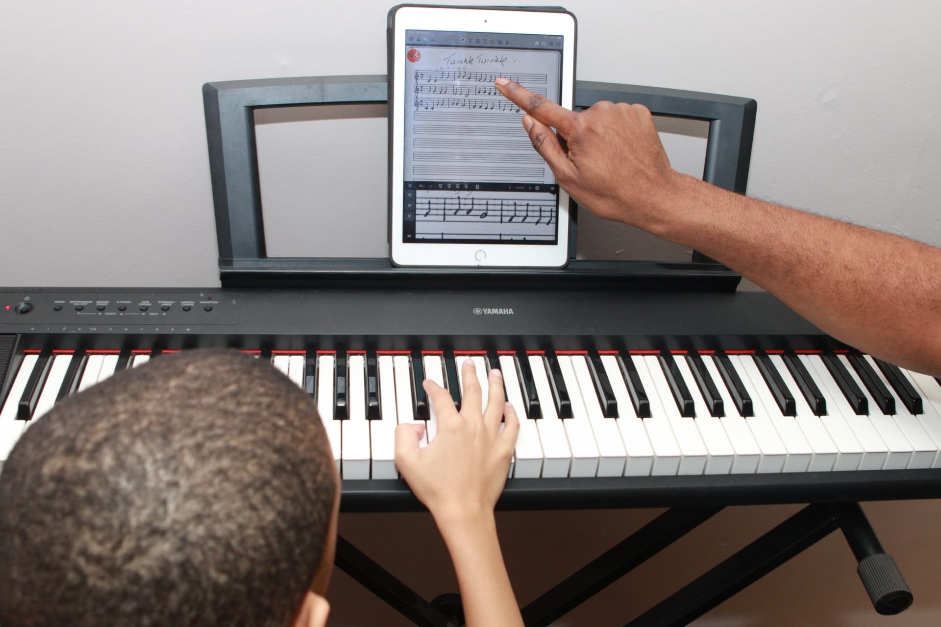 Keyboard lesson at Kynda Learning, South London