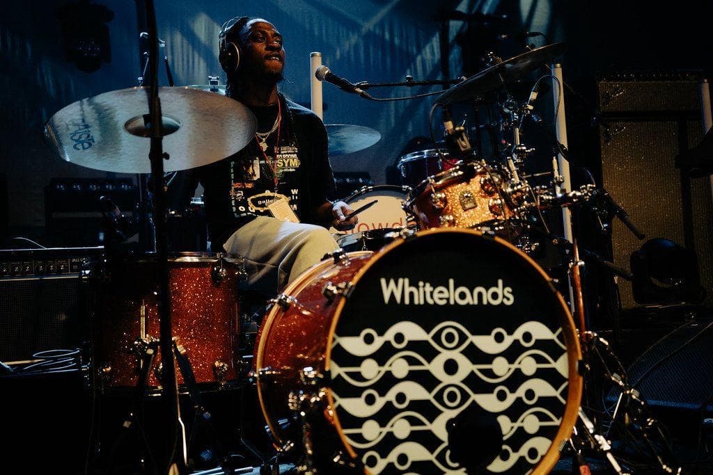 Jagun at the drum kit — drum lessons at Kynda Learning, South London